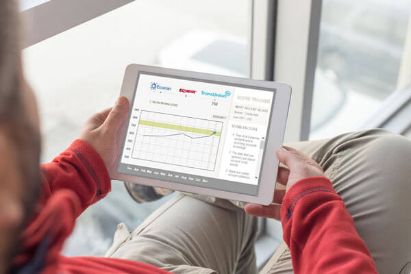 A tablet on a displaying a graph chart.