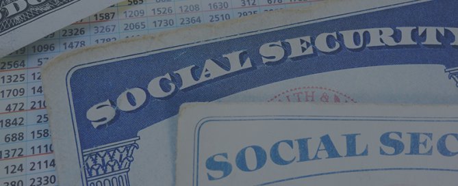 A two paper social security cards.