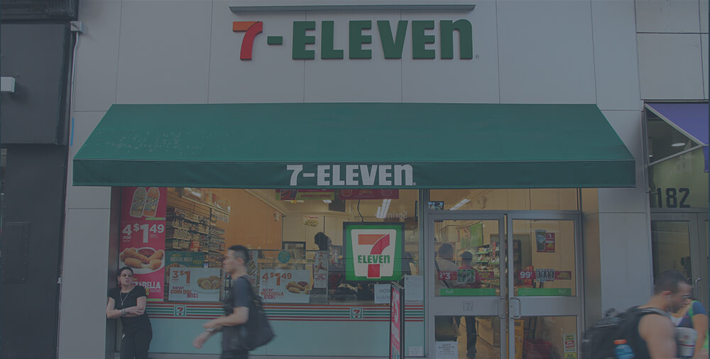A photo of a 7-eleven store.