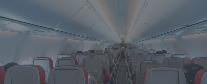 People sitting inside a airplane.