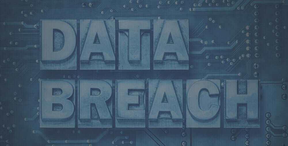 a sign that says "data breach"