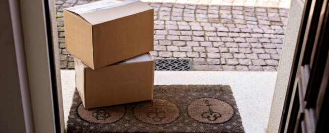 Two packages at the front door.