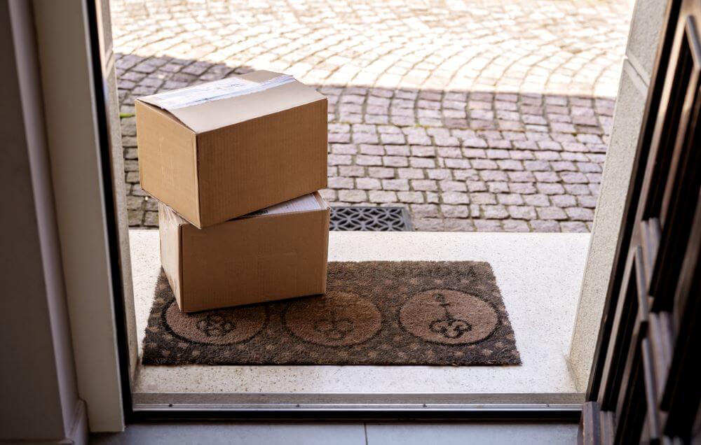 Two packages at the front door.