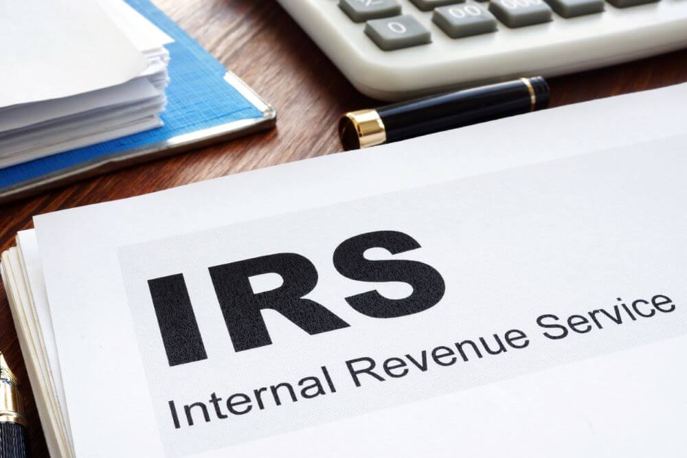 A IRS paper document on a table.